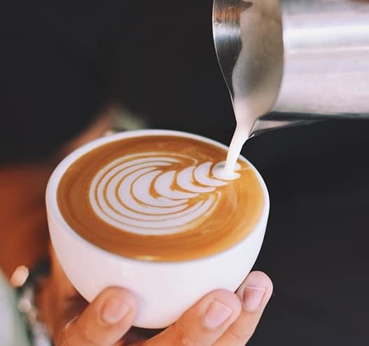 Pouring a flat white